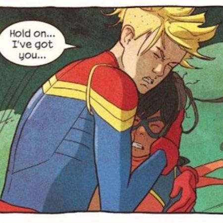 Captain Marvel hugging Ms. Marvel